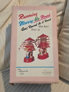 Vintage Red Wind-Up Running Merry Go Round with Music, Pig Figurine And Tassels